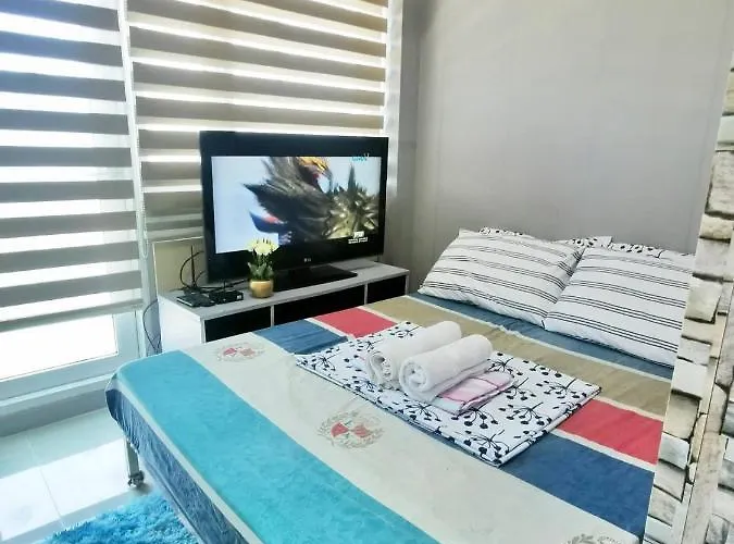 Homey 1 Bedroom With 2 Balconies At Grass Residences