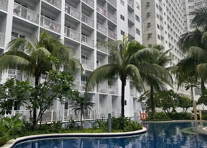Staycation Condo One Bedroom Balcony W Pool View Near Smx Sm Moa Ikea Naia Dfa Ocean Park