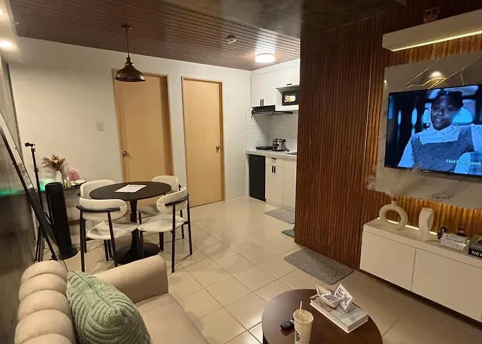 Suite 16 Ortigas Cozy 2-Bedroom Staycation With Netflix & Wifi