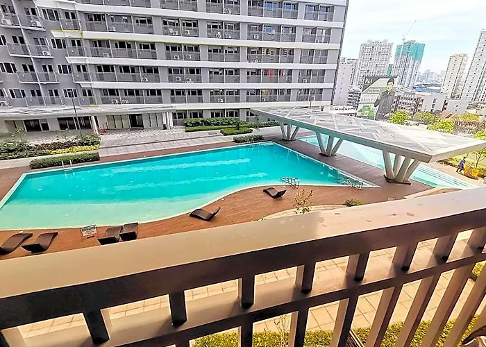 Stylish 1 Bedroom Condo Unit With Perfect Pool View Balcony At Fame Residences